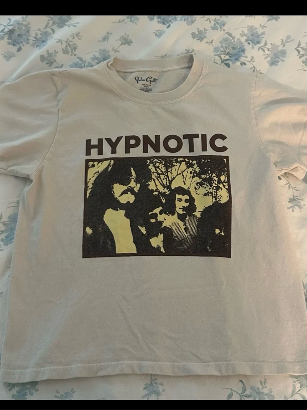 Brandy Melville Cream Tee with Black and Yellow Hypnotic Graphic